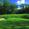 A sunny day view of a green at Fieldstone Golf Club of Auburn Hills.