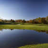 A view over the water of a hole at Shepherd's Hollow Golf Course.