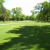 A sunny day view from a tee at Marquette Trails Golf Club.