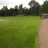 A view of the practice putting green and the clubhouse at Diamond Lake Golf Course.