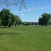 A sunny day view of a hole at Diamond Lake Golf Course.