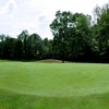 A view of green with narrow road on the left at Briar Ridge Golf & Country Club