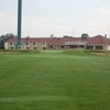 A view of the clubhouse and green #18 from fairway at Candlestone Inn Golf & Resort.