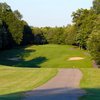 A view of green with narrow path on the right at Timber Ridge Golf Course