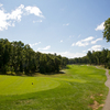 A view from tee with narrow road on the right at Stonegate Golf Club