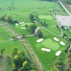 Aerial view of green #9, #18 and putting green at Bird Creek Golf Club