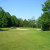 A view of green protected by bunkers at Quest Golf Club