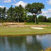 A view of green surrounded by water at Midland Country Club