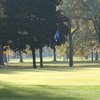 A sunny view of green at Maple Lane Golf Club