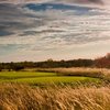 A sunny view of tee at Orchards Golf Club