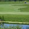 A view over the water of green at Wheatfield Valley Golf Club