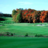 A fall view of a hole guarded by sand traps at Red from Mistwood Golf Course