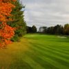 An autumn view of a fairway and green from Fountains at Garland Golf Course