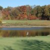 A fall view of a hole with water coming into play at The Woodlands Course at Whittaker