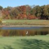 A fall view of a hole with water coming into play at The Woodlands Course at Whittaker