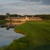 Eagle Eye Golf Club's giant clubhouse serves as the backdrop on No. 9