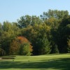 A view of a green protected by bunkers at Hilltop Golf Course