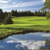 A view over the water of hole #7 at The Spruce Run Course from Grand Traverse Resort & Spa