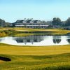 A view of the lake and clubhouse in background at Hawk Hollow Golf Course