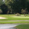 A view of green surrounded by water at Brookwood Golf Club