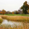 A view of hole #16 surrounded by water at Chandler Park Golf Course
