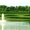 A view over the water of the 1st green at Taylor Meadows Golf Club