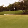 A view of green surrounded by water at Bruce Hills Golf Club
