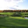 A green view surrounded by water at Black Bear Golf Club