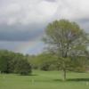 A view of a rainbow over Tomac Woods Golf Course