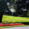 A view of a green and a fairway at Muskegon Country Club