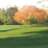 A fall day view of a green at Alpena Golf Club