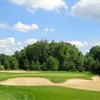 A view of green #17 surrounded by bunkers at The Woodlands Course at Whittaker