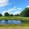 A view over the water of a green from The Links At Edmore (Julie Stickney)
