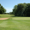 A sunny day view of a hole at Prairies Golf Club