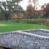A view over a bridge of a green at Saginaw Country Club.