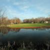 A view over the water of a hole from Royal at Canadian Lakes Country Club