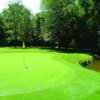 A view of a green with water coming into play at Raisin Valley Golf Course