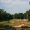 The par-3 fifth hole at Black Lake Golf Club features a waste bunker from tee to green