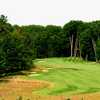 The par-4 13th hole is a long, uphill dogleg left at Black Lake Golf Club