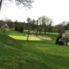 A spring day view of a hole at Black River Country Club.
