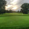 A sunset view of a hole at Currie Golf Course.