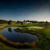 A view of a green with bunkers and water coming into play at Manistee National Golf & Resort.