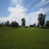A sunny day view of a fairway at Greystone Golf Club.