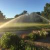 A view of a green beeing watered at Indian Lake Golf and Country Club.