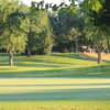 A sunny day view of a hole at Traverse City Golf & Country Club.