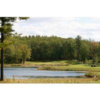 Holes No. 6 and 7 play on flat land around a water hazard at Timberstone Golf Course. 