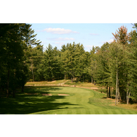 Timberstone Golf Course's par-3 seventh hole plays downhill and has water behind the green. 
