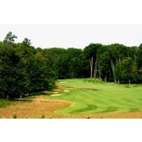 Black Lake Golf Club's par-4 13th hole is a long, uphill dogleg left.