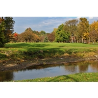 The 11th hole on the West Course at Warren Valley Golf Club is one of several that plays over the river. 