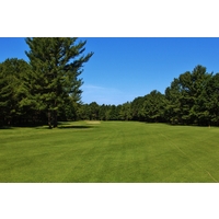 Trees surround the par-5 15th hole on the Canthooke Valley golf course at Manistee National in northern Michigan.
